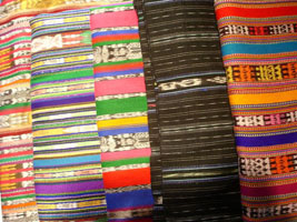 stack of woven Guatemalan fabrics