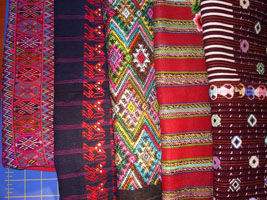 stack of woven Guatemalan fabrics